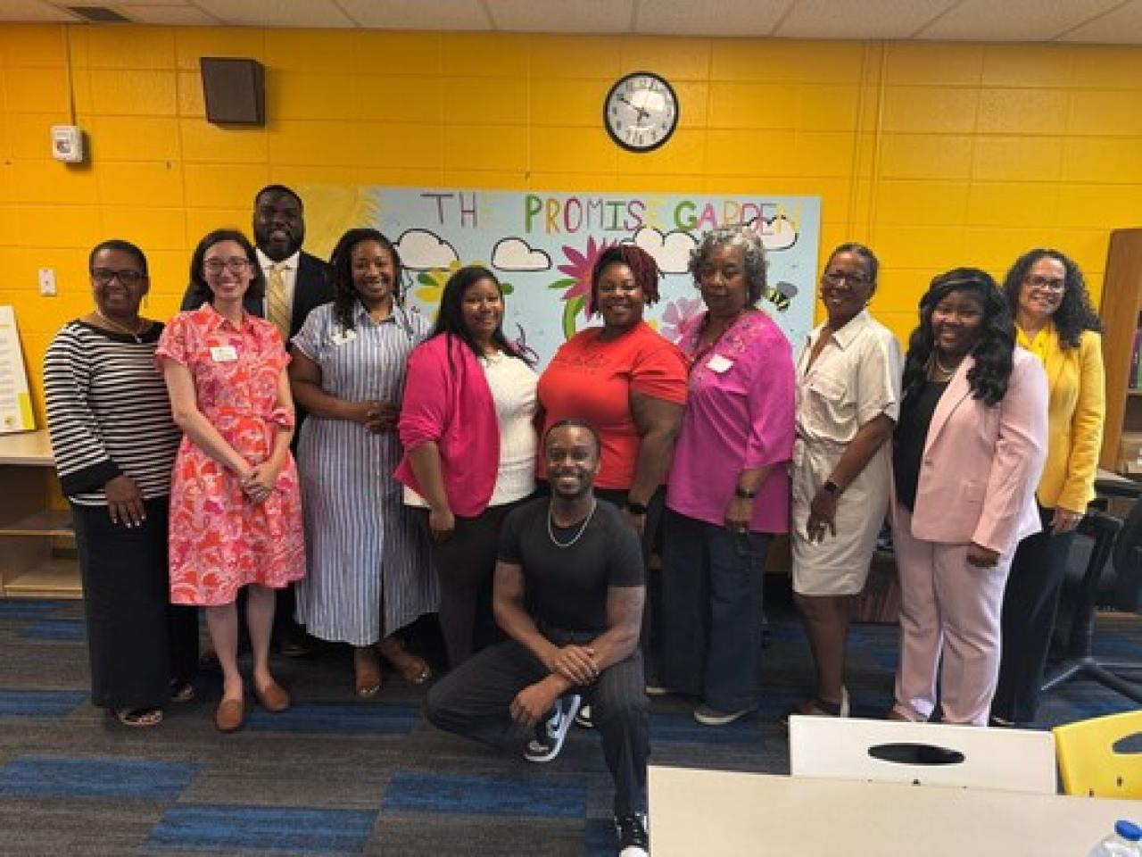 Staff from NCFL and Village of Promise during a recent Let's Learn Together Outside training. " "