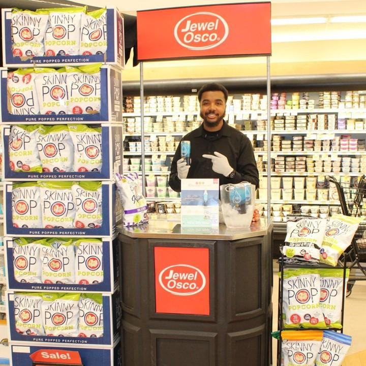 Person posing at booth at Jewel-Osco Mind, Body, Planet event