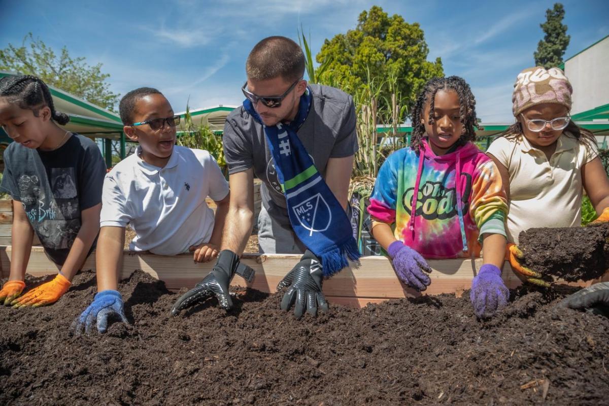 LA Galaxy Goalkeeper John McCarthy joined students to help expand and refurbish the gardens at Annalee Elementary School in Carson. 