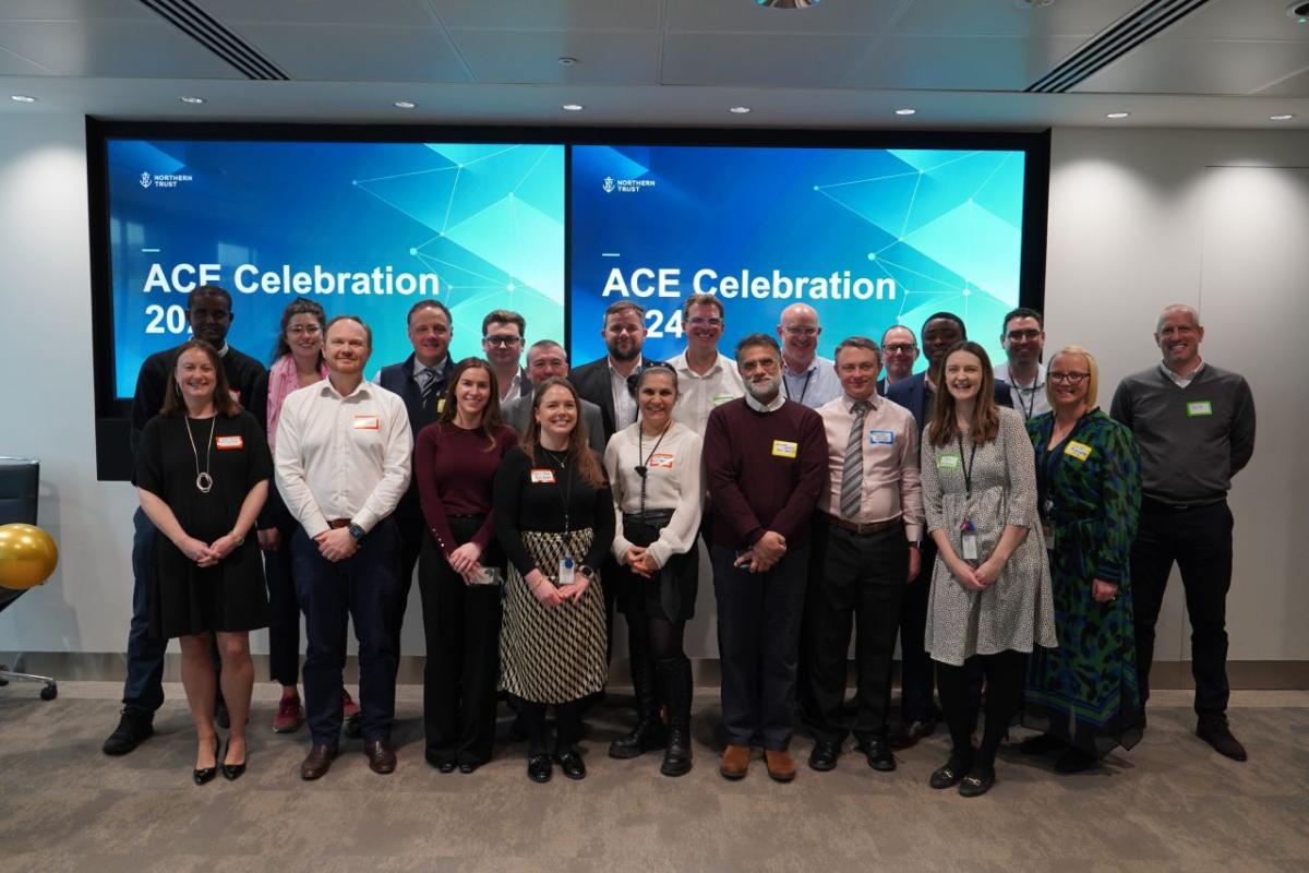 A group of employees stood together at the ACE celebration 2024