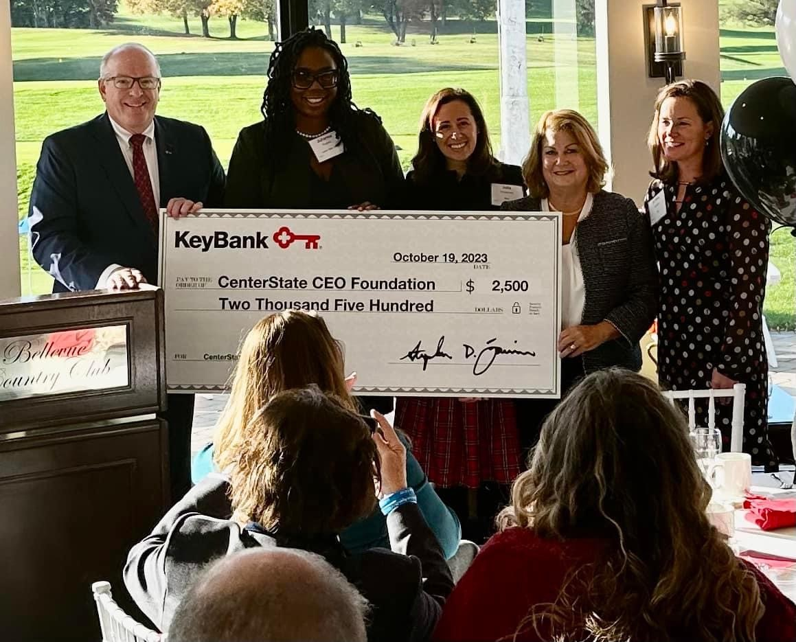 KeyBank Key4Women event; donation check of $2,500 shown.