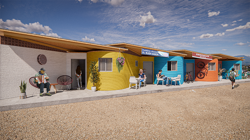 A group of four, colorful, 3D-printed affordable homes