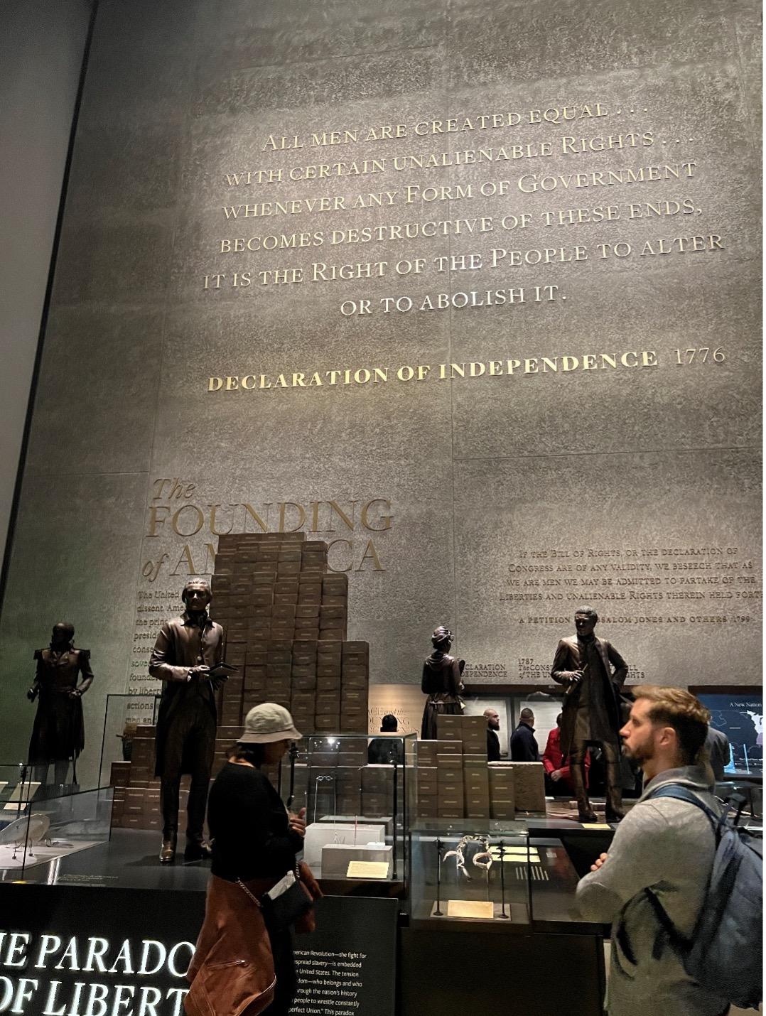 The museum contrasts the tenets of America’s founding with the realities of slavery. A bronze statue of Thomas Jefferson stands in front of bricks with the names of people he enslaved.