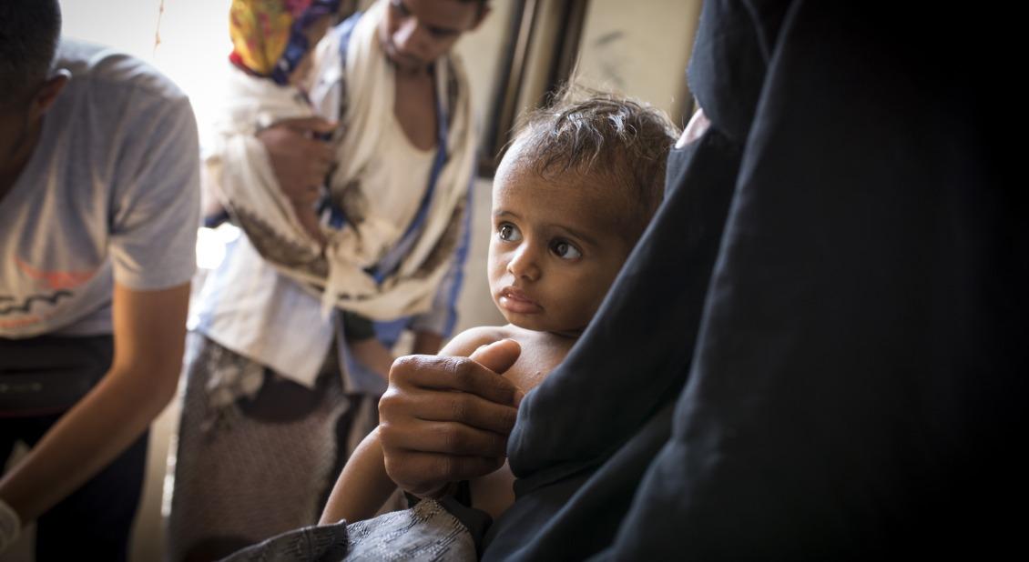 A child is treated at one of Action Against Hunger's health clinics in Yemen. / Photo by Florian Seriex