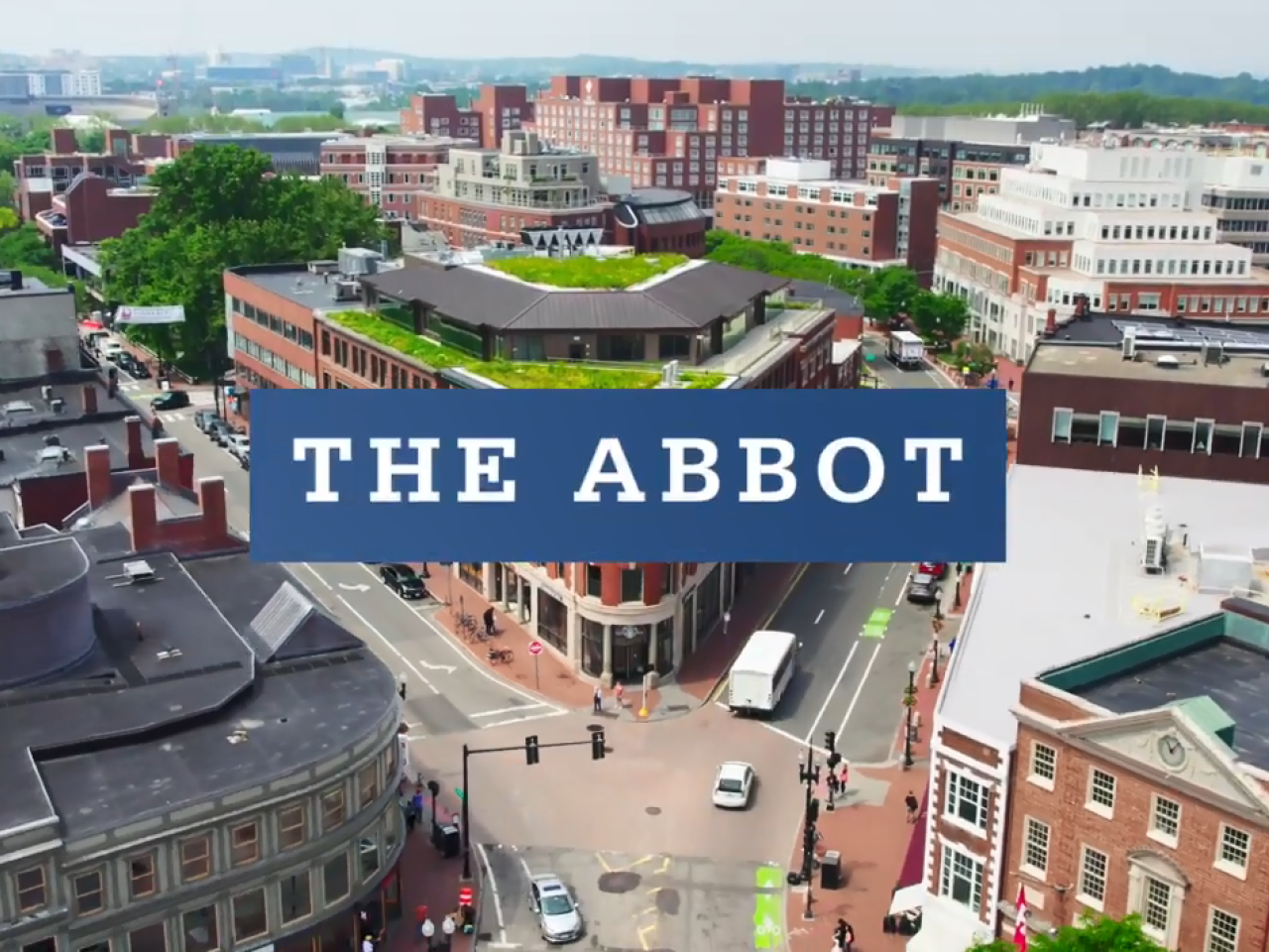 "The Abbot" over an aerial view of the building and surrounding area.