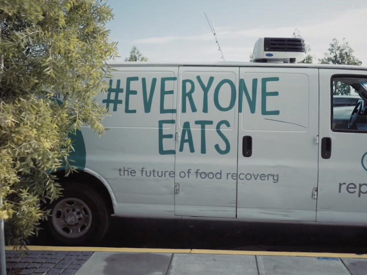 Van with the words "#Everyone Eats" on the side