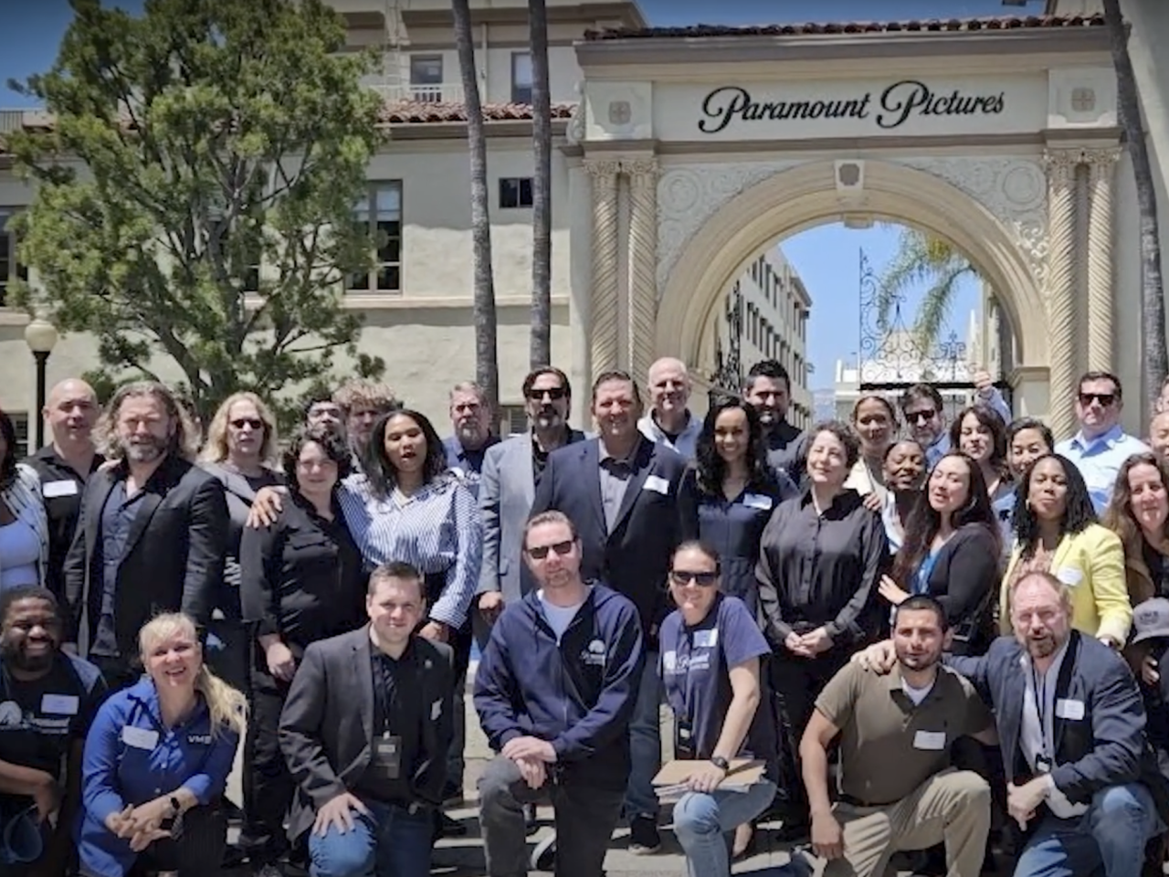 group of people in front of Paramount Pictures 