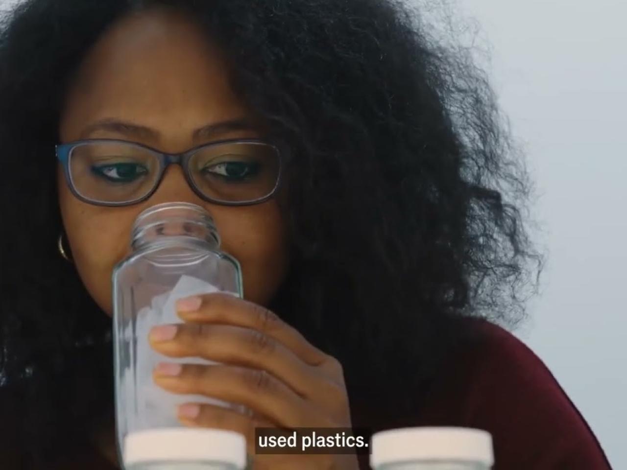 Person drinking out of a bottle