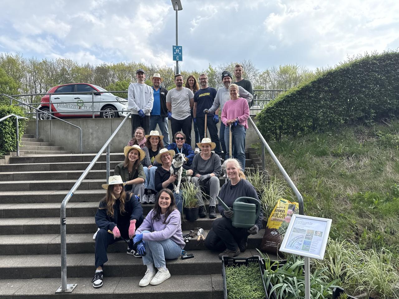 Equipped with shovels, gloves, and watering cans, the group spent the day planting a total of 412 new plants and sowing flower seeds.