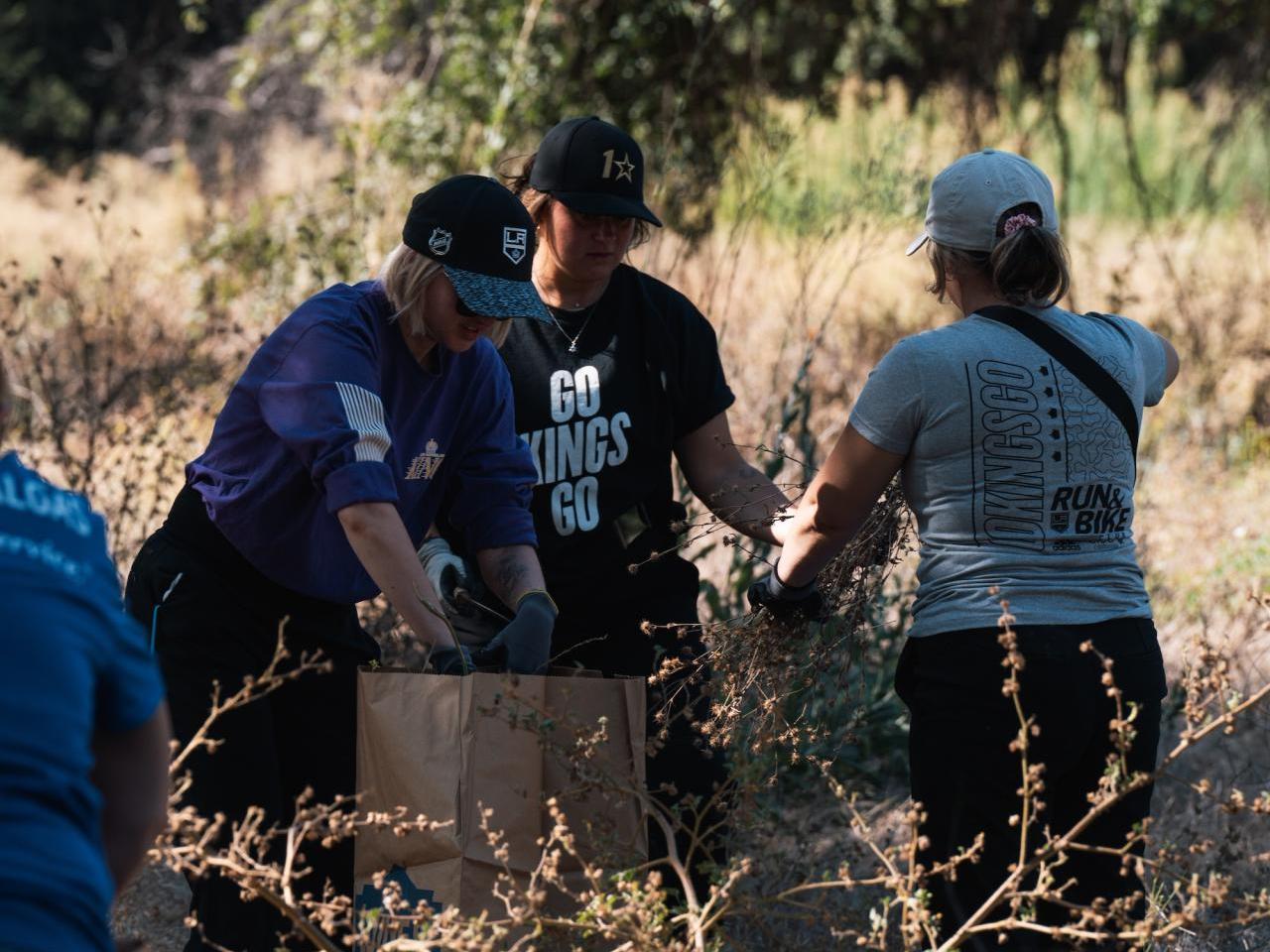 Employee volunteers from the LA Kings and SoCalGas helped remove invasive plants from the upper Los Angeles River area.