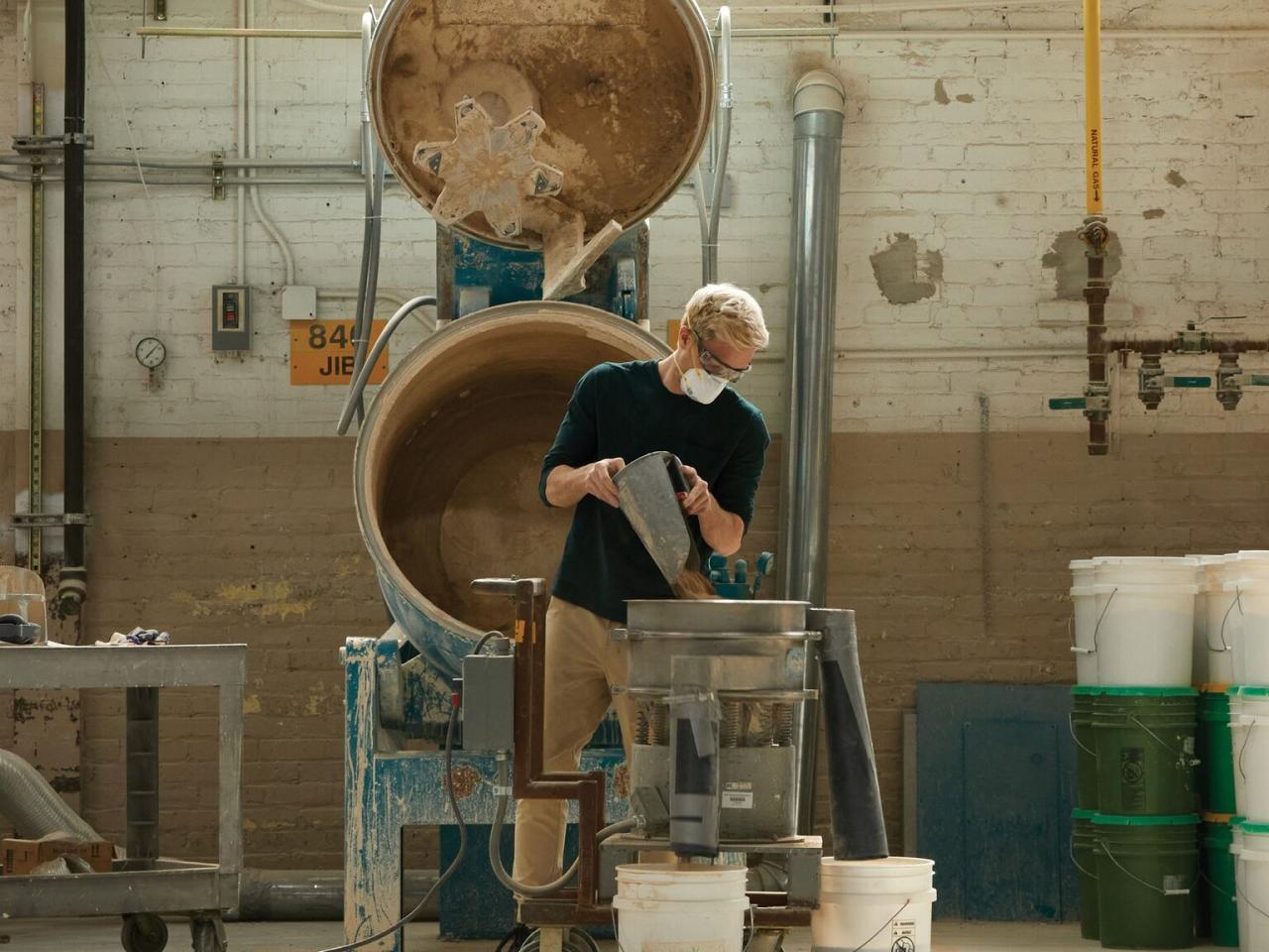A person repurposing pottery