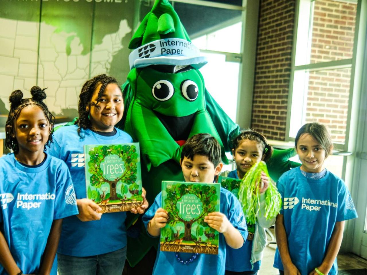 5 kids and the International Paper Mascot