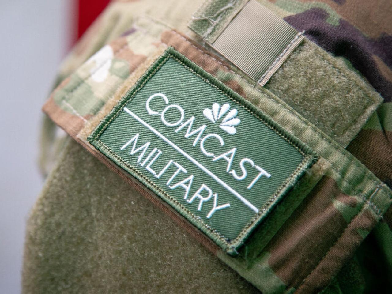 A Comcast military badge 