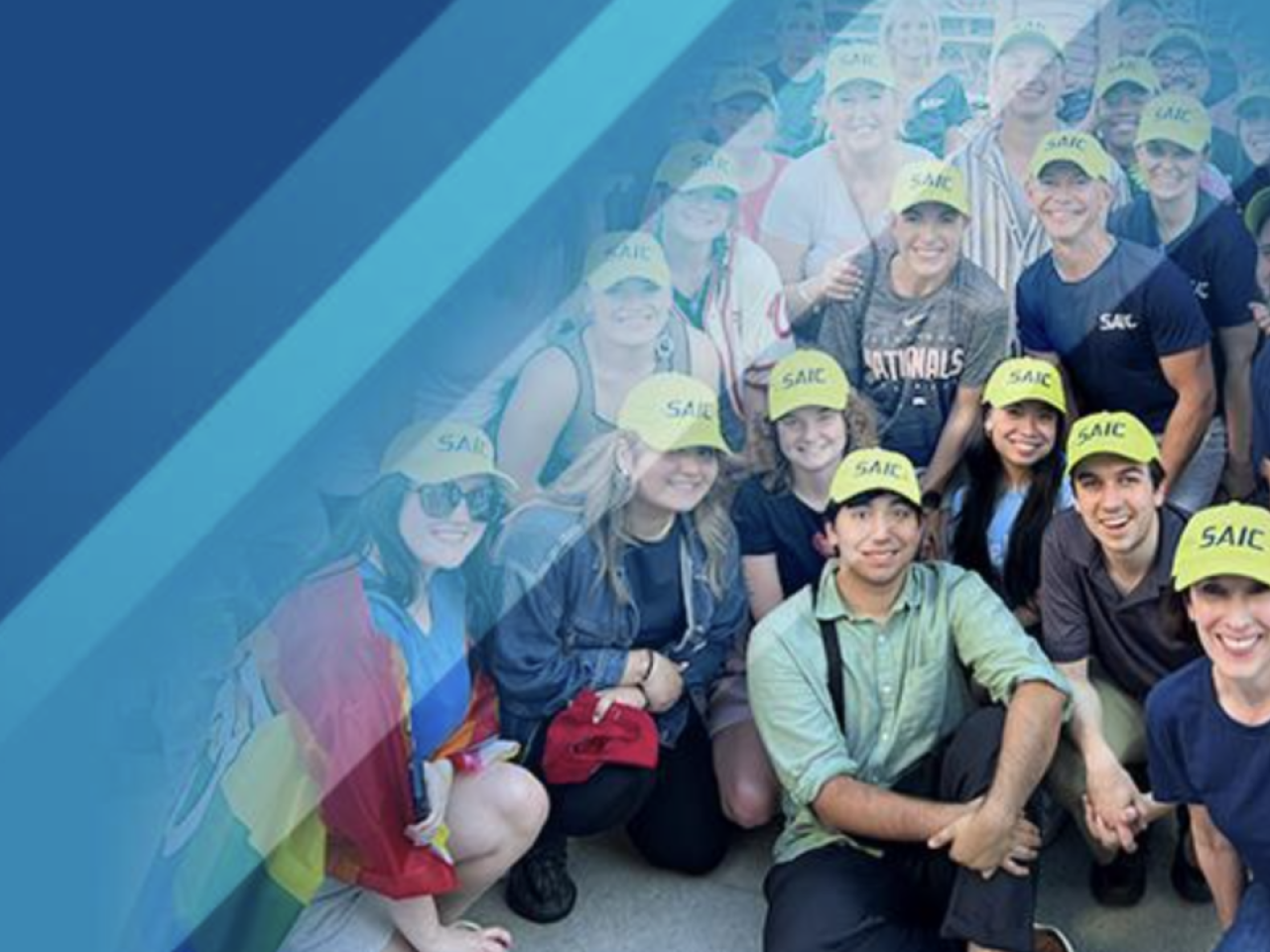 A group posed in matching hats spliced with a blue background on the left.