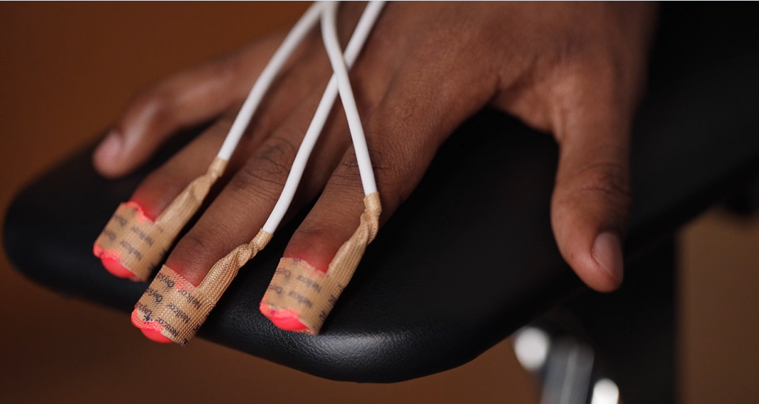 Hand getting blood oxygen levels measured 