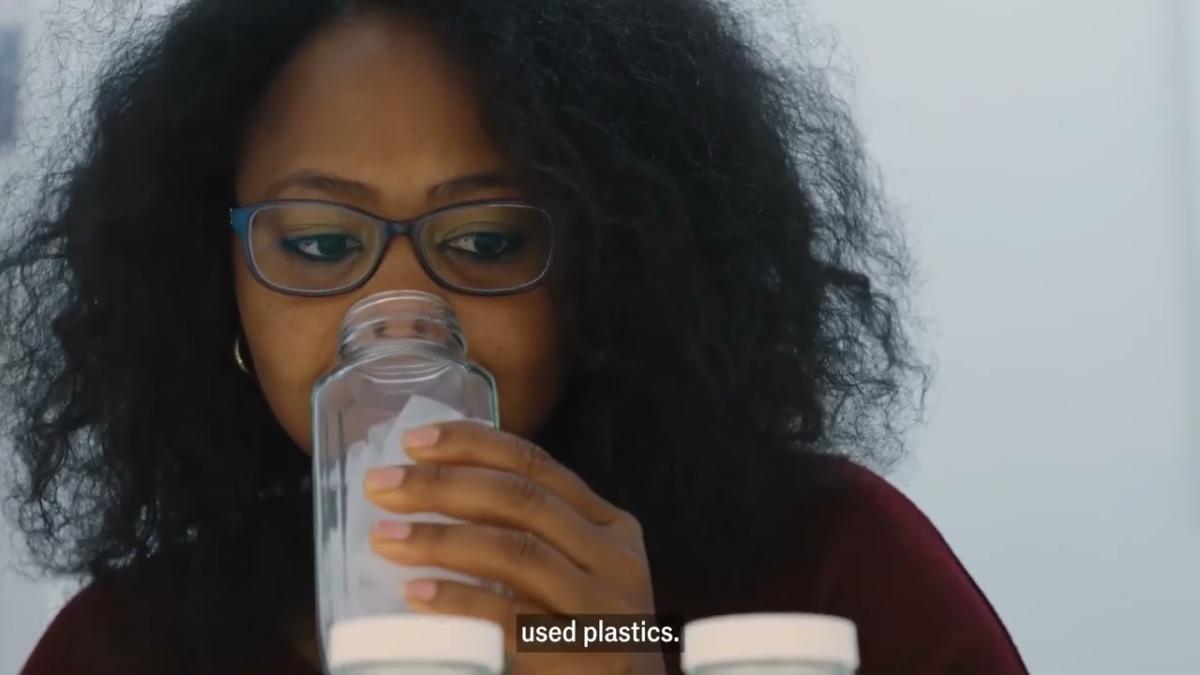 Person drinking out of a bottle