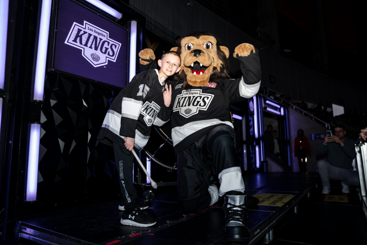 Joshua joined King’s mascot Bailey for a 3rd period drum moment with the crowd.