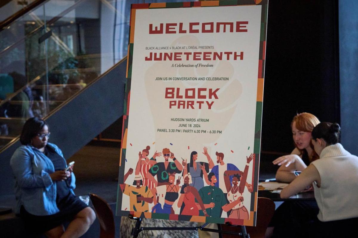 Sign that says "Welcome Juneteenth Block Party"