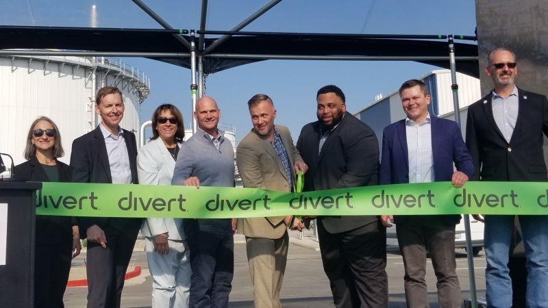 People posing at ribbon cutting