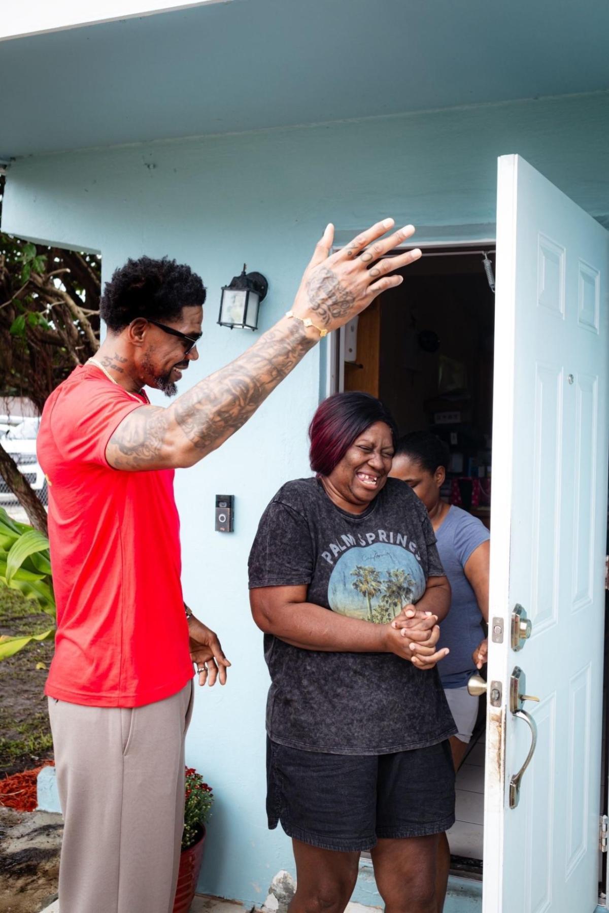 Basketball player from the Miami HEAT surprise homeowner at her doorway