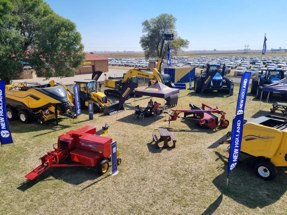 Agricultural machinery on display in a field at NAMPO 2024
