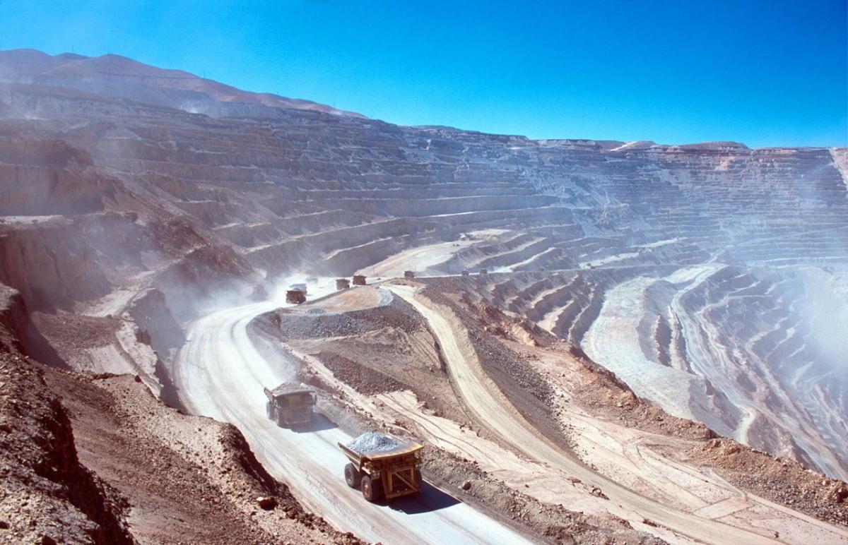 vehicles carrying material on dusty roads