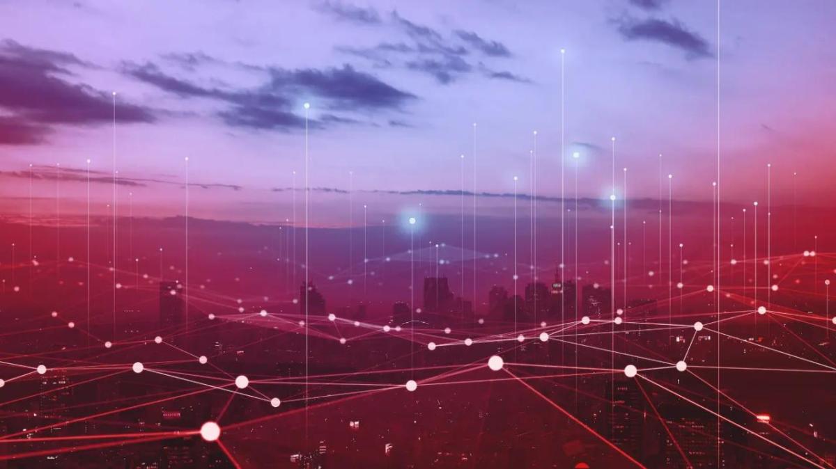 Digitized points, lines connecting them, and others extending up over the background of a red and purple shaded sky and city landscape.