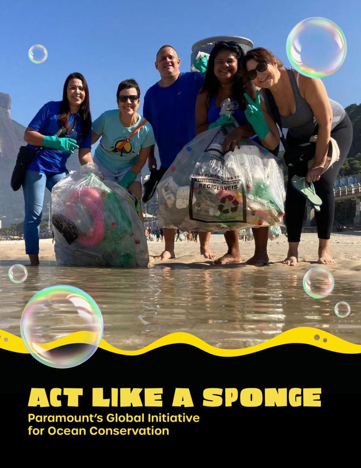 "Act like a sponge, Paramount's Global Initiative for Ocean Conservation" People standing on the beach