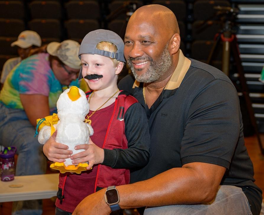 Young camper at Sunrise Day Camp shown with his Aflac My Special Duck.