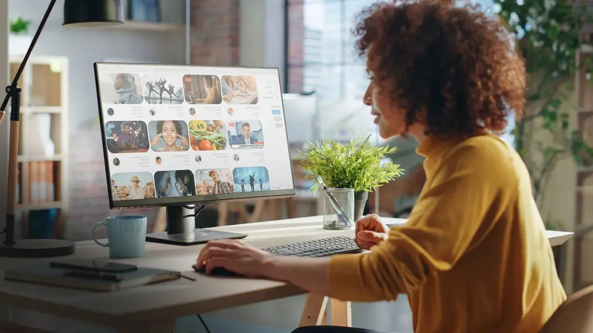 Female on a zoom call at her desktop.