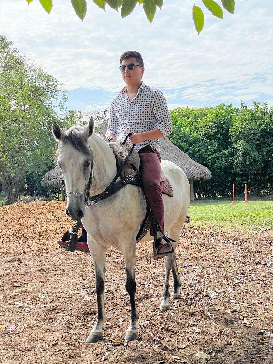 Austin riding a horse