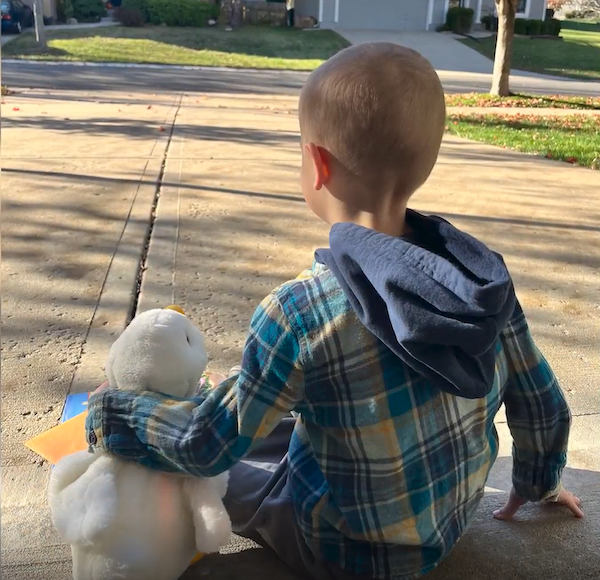 Young boy shown with My Special Aflac Duck.