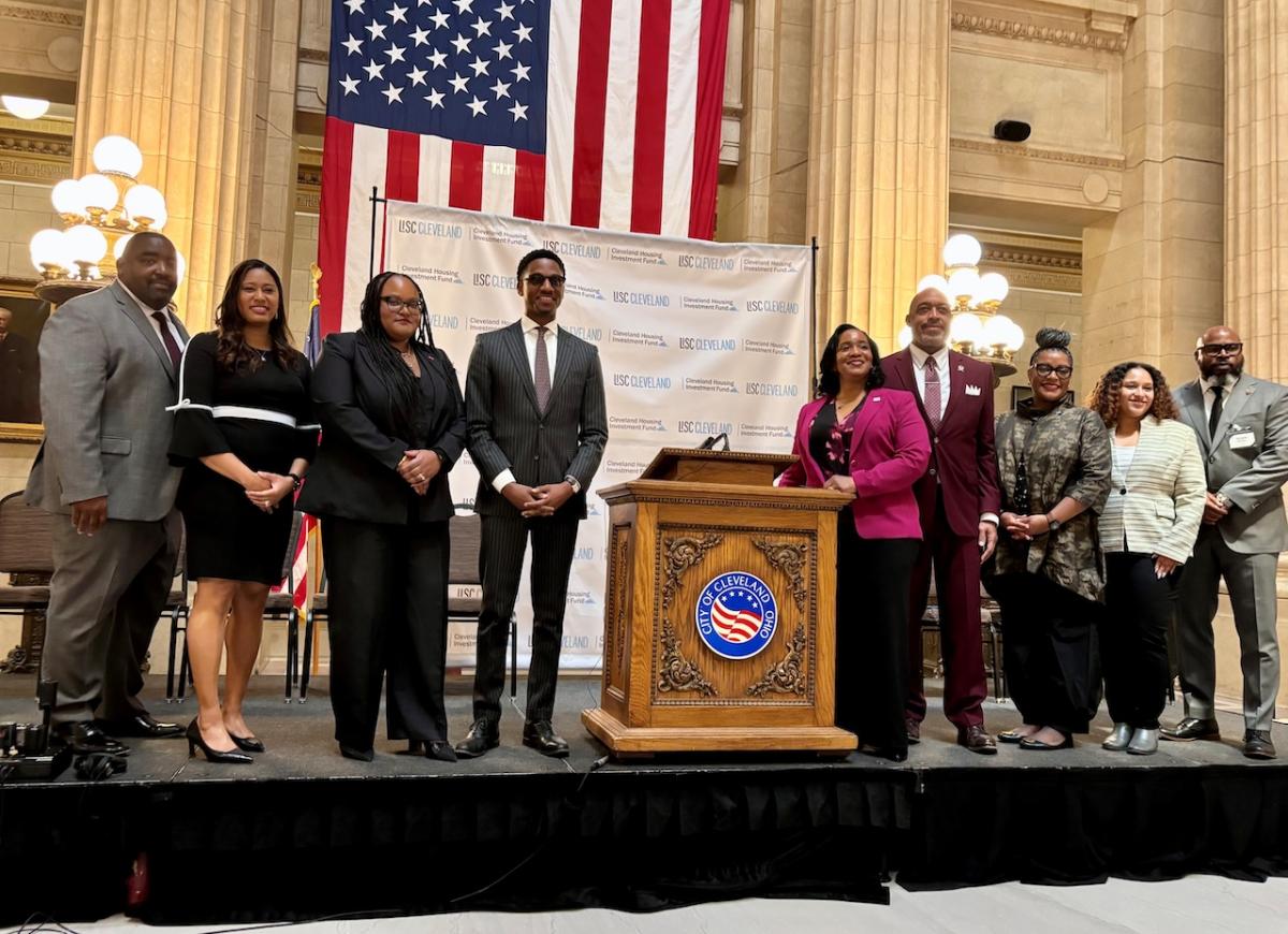 Representatives from the City of Cleveland shown on a stage.