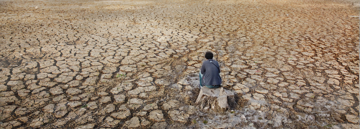 Cracked and dry ground shown with evidence of no rainfall.