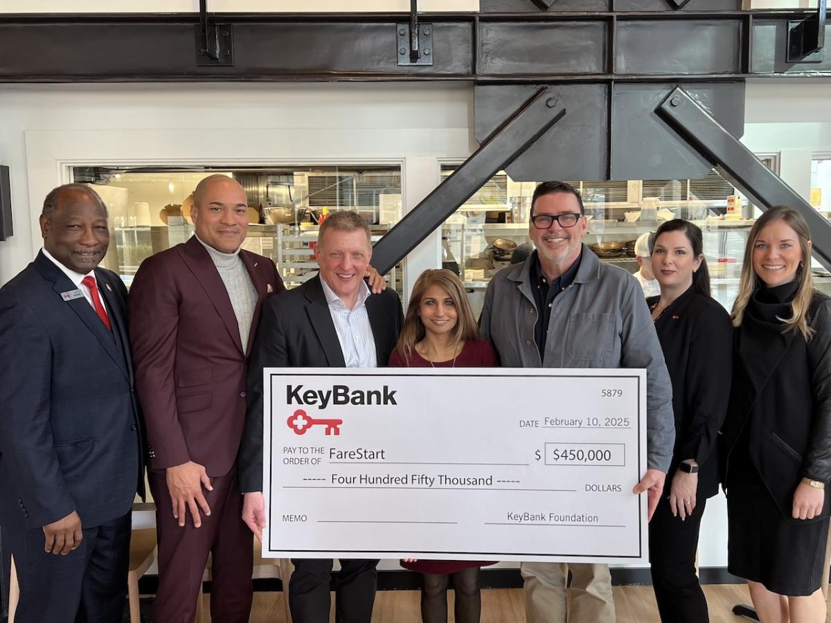 FareStart and KeyBank Team Members shown with a $450,000 grant check.