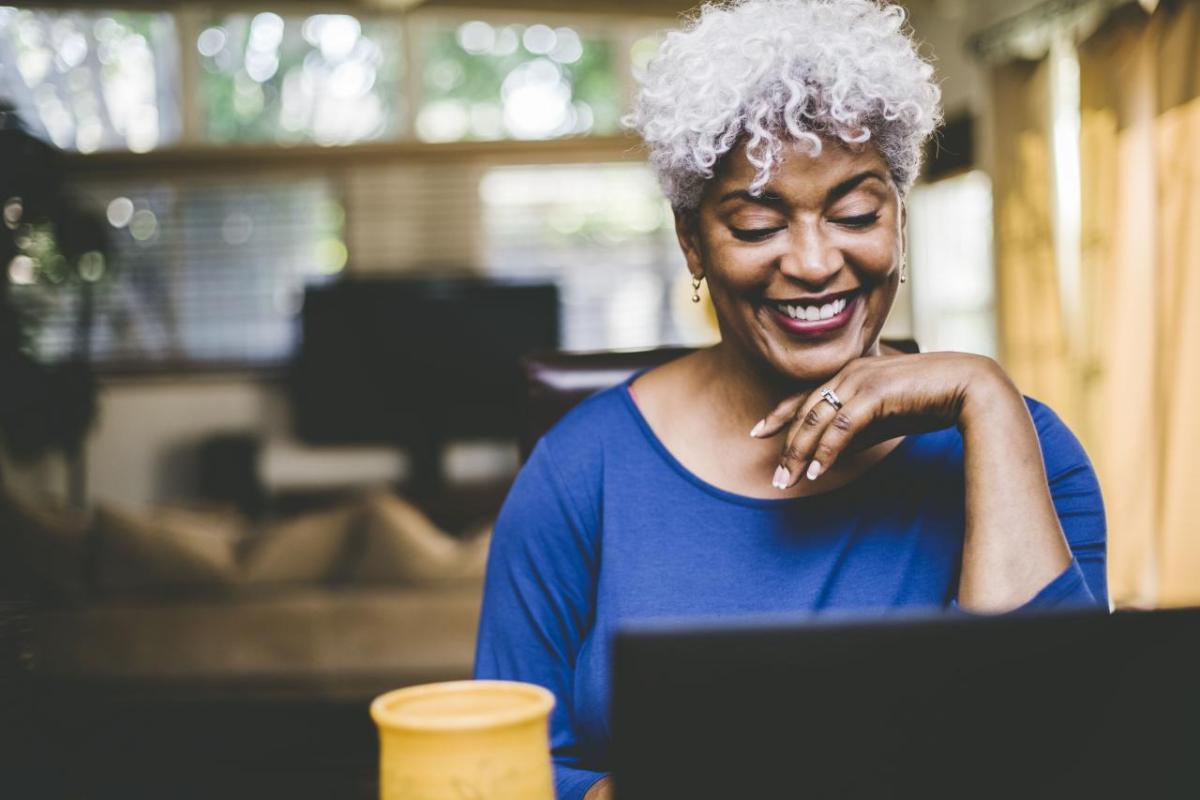 Women looking down at laptop