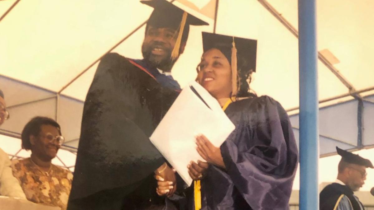 Two people during a graduation 