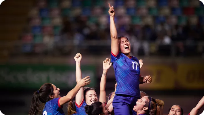 Female soccer team winning the game!