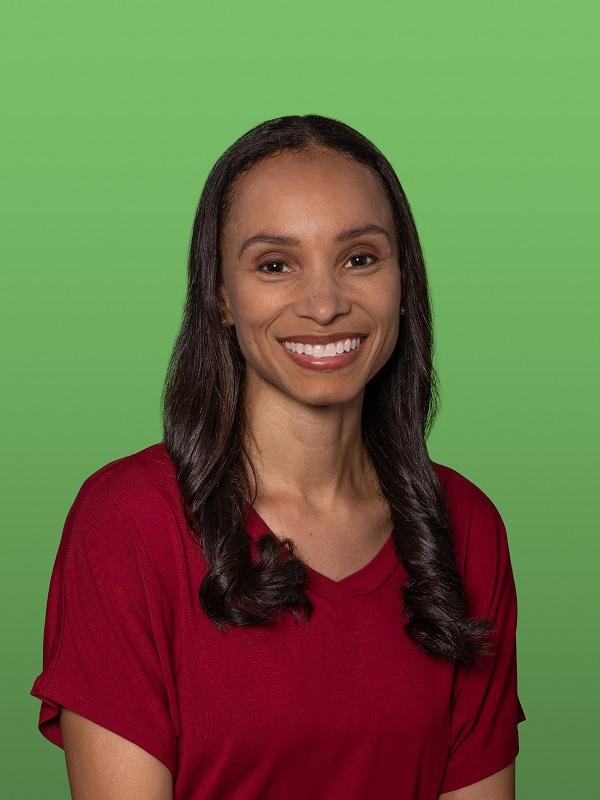 headshot of Lerena Holloway against a green background