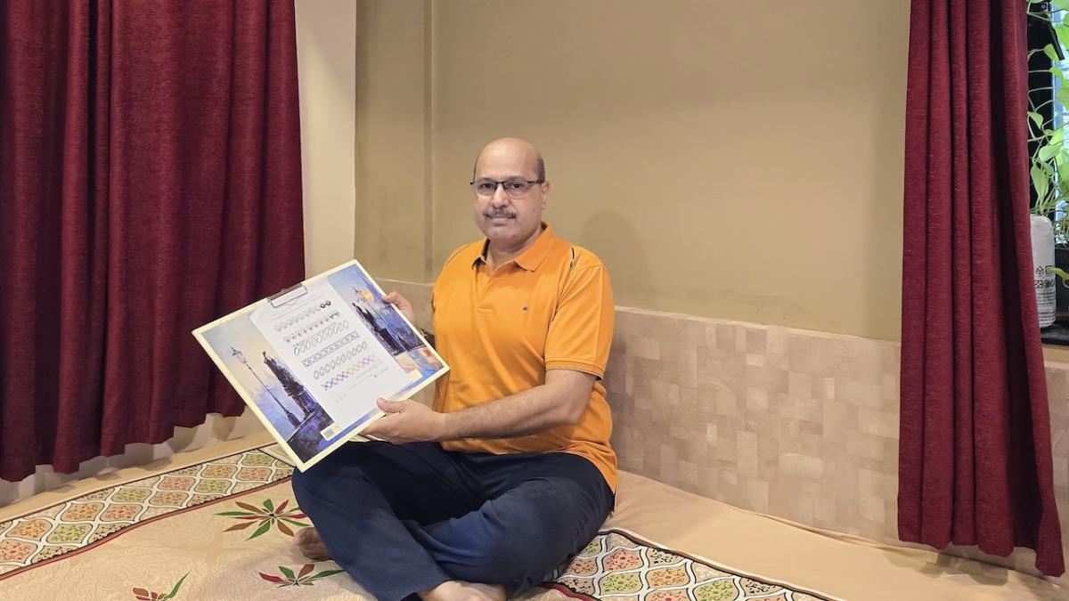 Abhay's Cool Tips for Career Success. Abhay shown with a book.