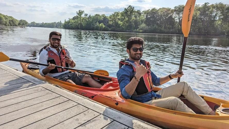 Manoj in a canoe with a friend.