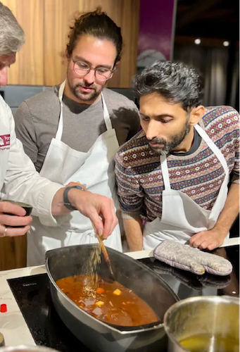 Taking a Cooking class during a German off-site with Shirsh.