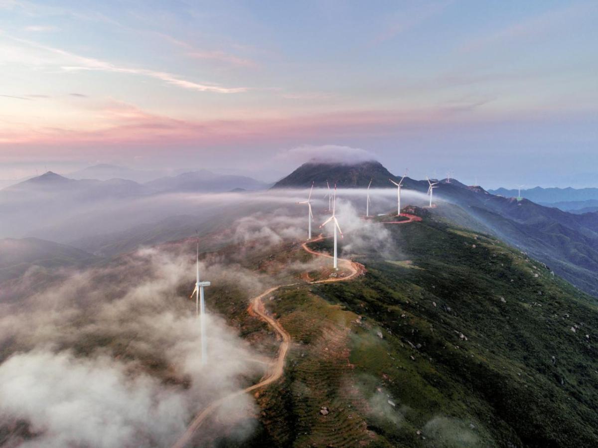 mountain pathway with wind turbines