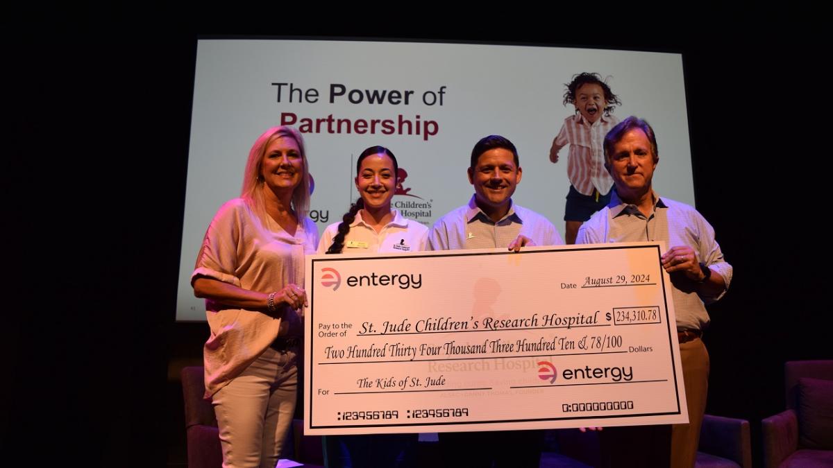 4 people with Check to St. Jude Children’s Research Hospital from Entergy Employees