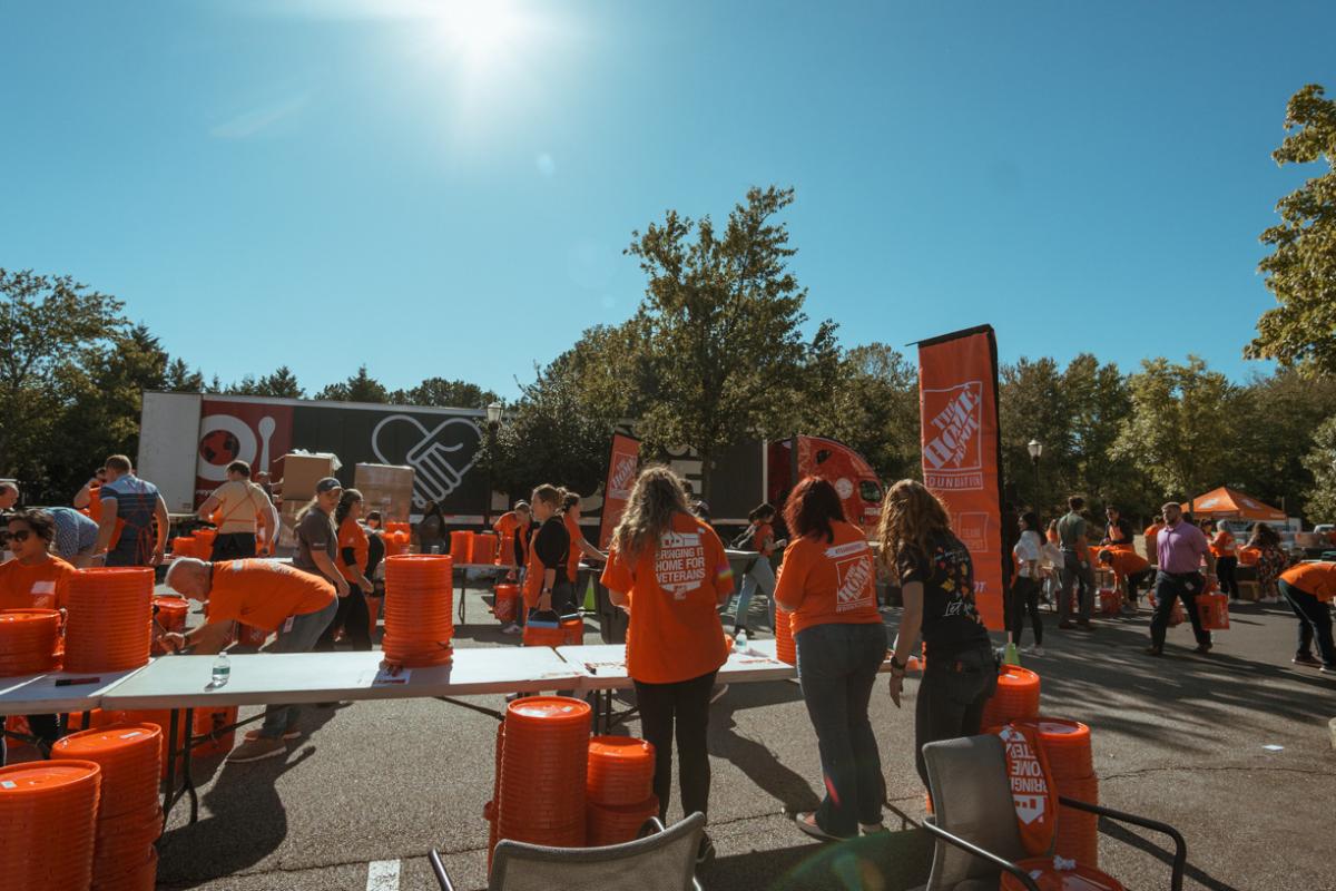 Volunteers setting up tables to prepare supplies for the hurricane relief.