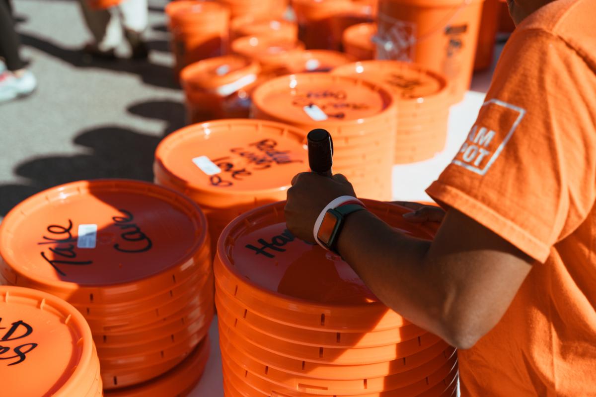 Buckets being labeled for disaster relief.