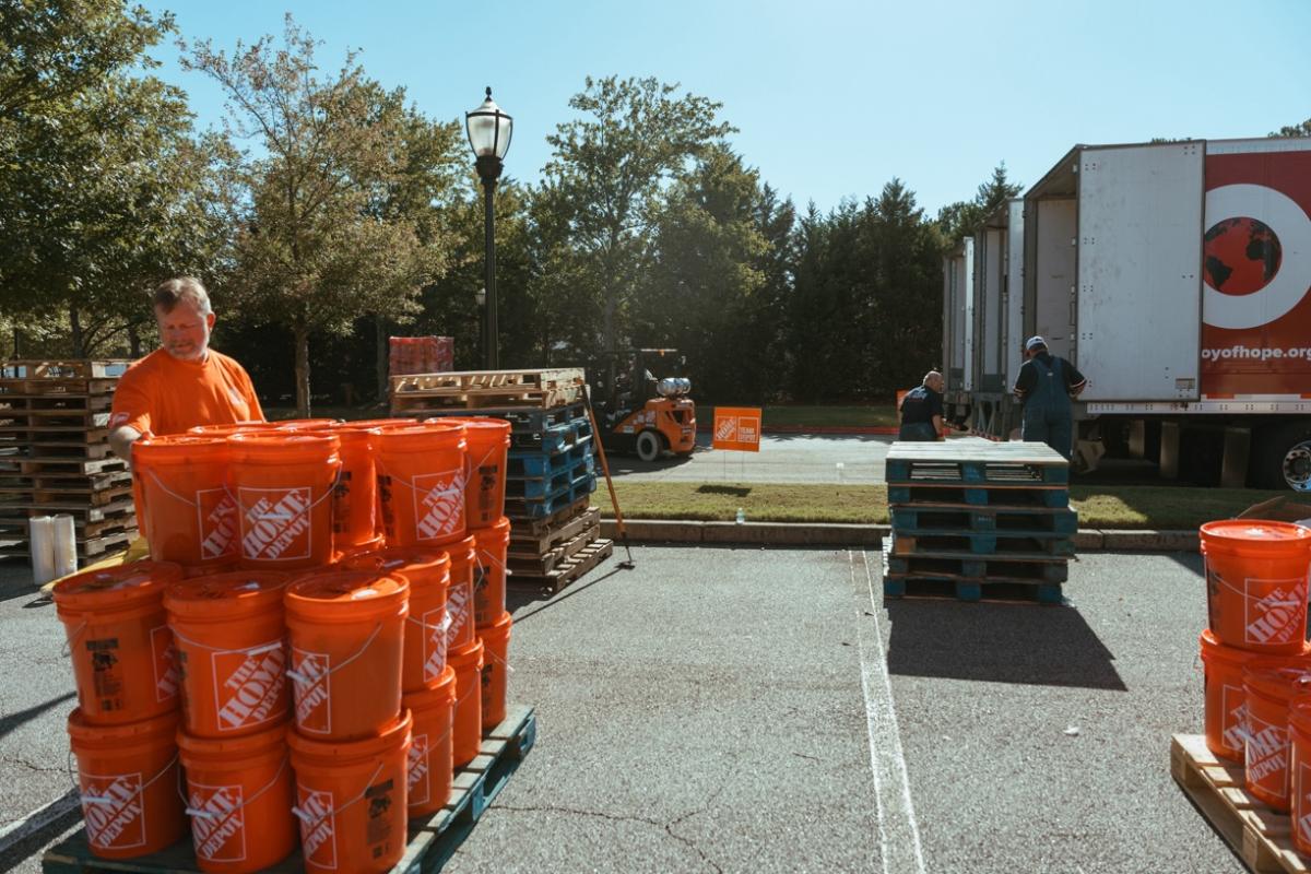 Buckets stacked on pallets; waiting to be loaded onto trucks.