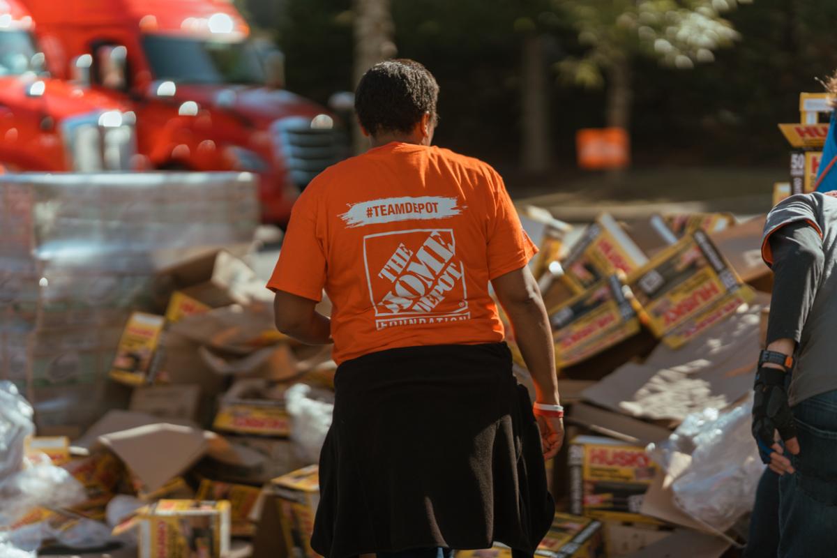 The Home Depot volunteer shown with disaster relief materials.