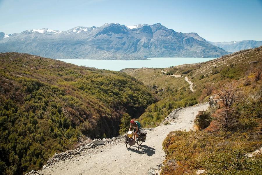 Thomas Allison photograph of a cyclist climbing a rugged mountain path on a bike.