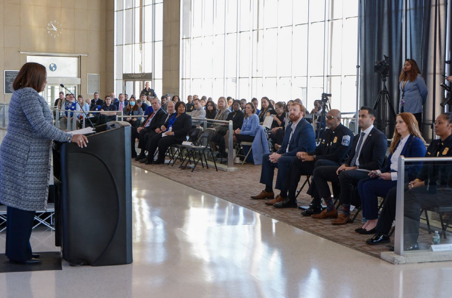 A person stood in front of an audience 